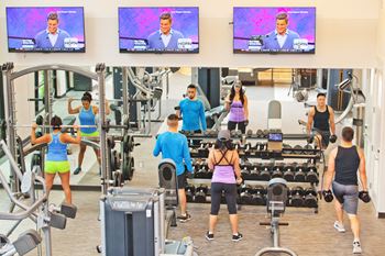 Two-story fitness center with yoga and spin room
